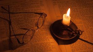 Reading by candlelight