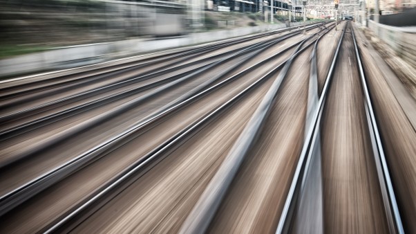 Looking out of the locomotive cabin at full speed. Blurred motion.