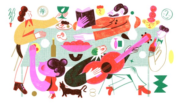 people gathered around the table, eating and celebrating