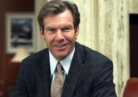 Dennis Quaid is the 50-something guy who's got it all together at the office