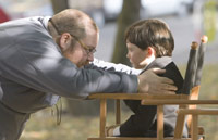 Director John Moore on the set with Seamus Davey-Fitzpatrick