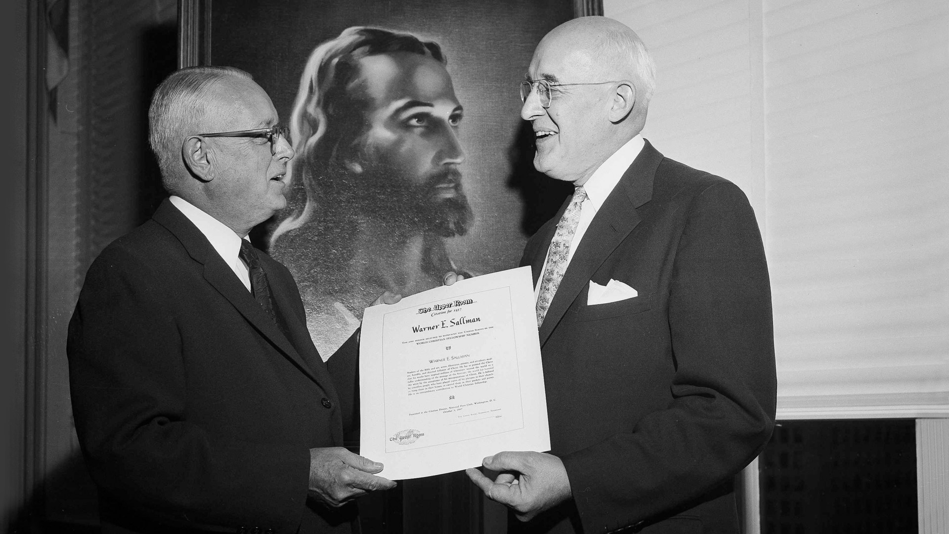 Rev. Dr. J. Manning Potts, left, presents the 1957 Upper Room Award for World Christianity Fellowship to artist Warner Sallman.
