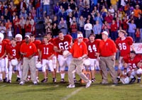 Coach Taylor (Kendrick) stalks the sidelines