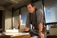 Martin Sheen as Captain Queenan and Mark Wahlberg as the potty-mouthed Sergeant Dignam