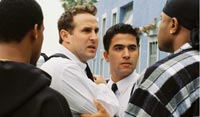 Missionaries Farrell and Lozano tussle with gang members in 'States of Grace'