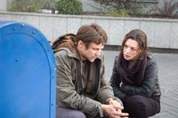 Kevin (Marc Blucas) and Jennifer (Justine Waddell) are both apparent targets of the Riddle Killer