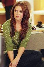 Mandy Moore as insecure caterer Milly