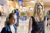 Makenzie Vega as Paige and Kristen Stewart as Lucy