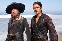 Barbossa (Geoffrey Rush) and Will (Orlando Bloom)
