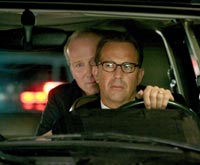 William Hurt as Marshall, the proverbial devil on the shoulder