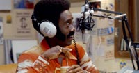 Don Cheadle as radio talk show host Petey Greene
