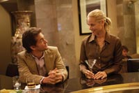 Grigg and Jocelyn share a drink and a laugh