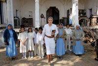 Angelica Houston as the brothers' long-lost mother