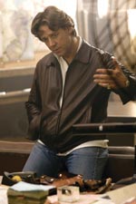 Russell Crowe as Richie Roberts, an honest cop