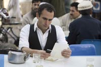 Khalid Abdalla as the adult Amir