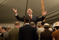 Mordecai Ham (Cliff Bemis) gives the altar call