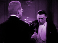Dracula, repelled by a crucifix