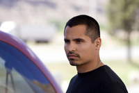 Michael Pena as TK