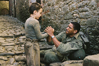 Angelo bonds with Corporal Negron (Laz Alonso)