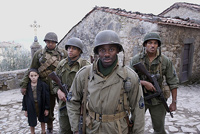 The men and Angelo in the village