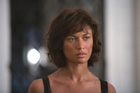 Olga Kurylenko as Camille