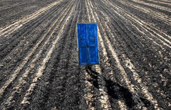 The blue door symbolizes wasted opportunity for Karim