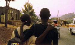 The two friends walk down the road