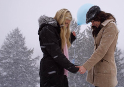 St. James in a scene with Logan White