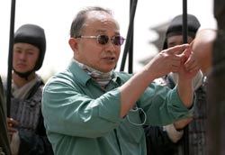 Director John Woo on the set