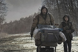 Viggo Mortensen and Kodi Smit-McPhee as father and son