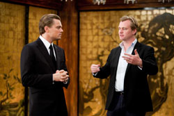 Director Christopher Nolan (right) on set with DiCaprio