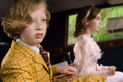Eros Vlahos and Celia Gray as the bratty nephew and niece