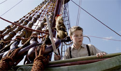 Poulter as Eustace, with Reepicheep the mouse