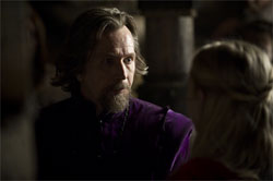 Gary Oldman as Father Solomon