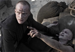 Paul Bettany as Priest, Josh Wingate as Familiar No
