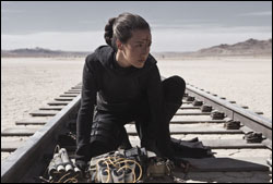 Maggie Q as Priestess