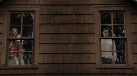 Shane West (right) as a mystery man
