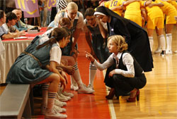 The coaches prep the Macs for the big game