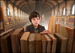 Asa Butterfield as Hugo Cabret