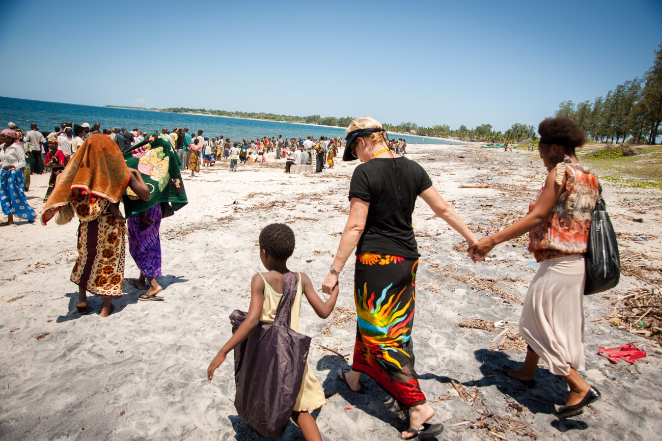 Walking toward a baptism which will take place in the Indian Ocean—100 yards from the Iris base entrance.