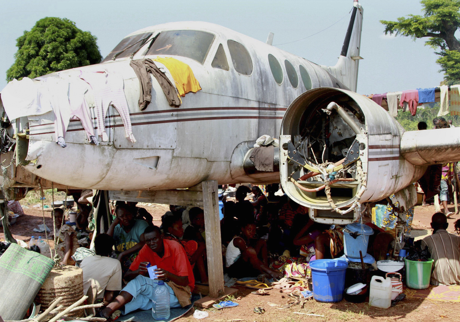 Central Africans displaced by weekend fighting take shelter at Bangui airport.