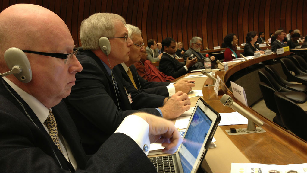 Geoff Tunnicliffe (left) with Dan Kosten and Leith Anderson at a United Nations refugee summit in 2012.