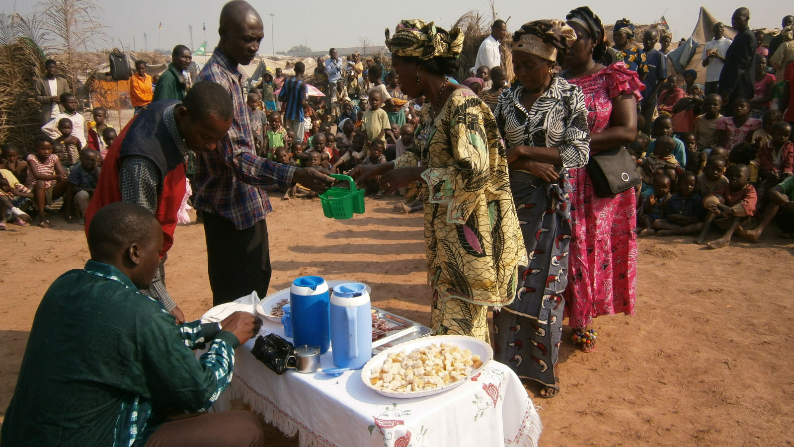 Communion in a refugee camp.