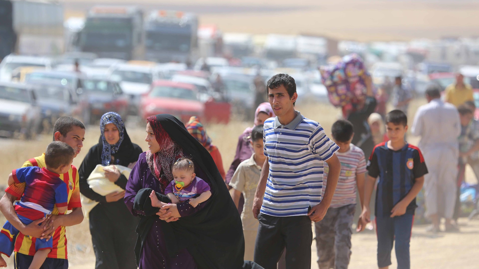 Thousands of Iraqis flee Mosul after ISIS takeover.