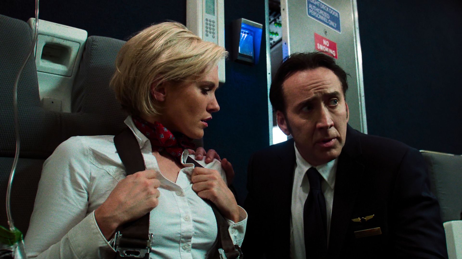 Nicky Whelan and Nicolas Cage in 'Left Behind'