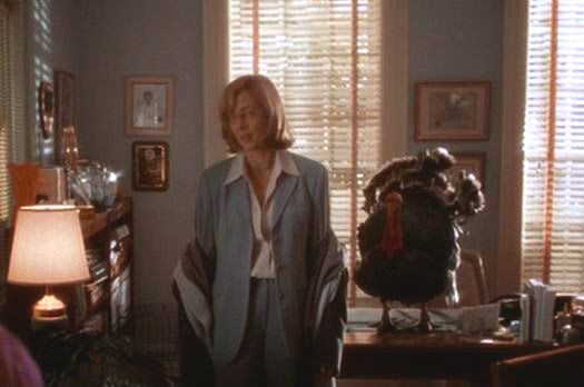 C.J. Cregg (Alison Janney) deals with the turkey in 'The West Wing'