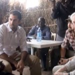 Rep. Frank Wolf with citizen journalist Ryan Boyette, interviewing a Nuban woman refugee in the Yida camp, Unity State, South Sudan.