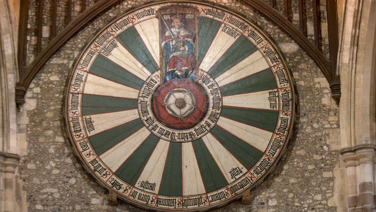 The round oak table painted with the Tudor rose with King Arthur on top and the names of his 24 knights around the outside, Great Hall, the only surviving part of the Norman castle built by Henry III between 1222 and 1236, Winchester, Hampshire, UK.