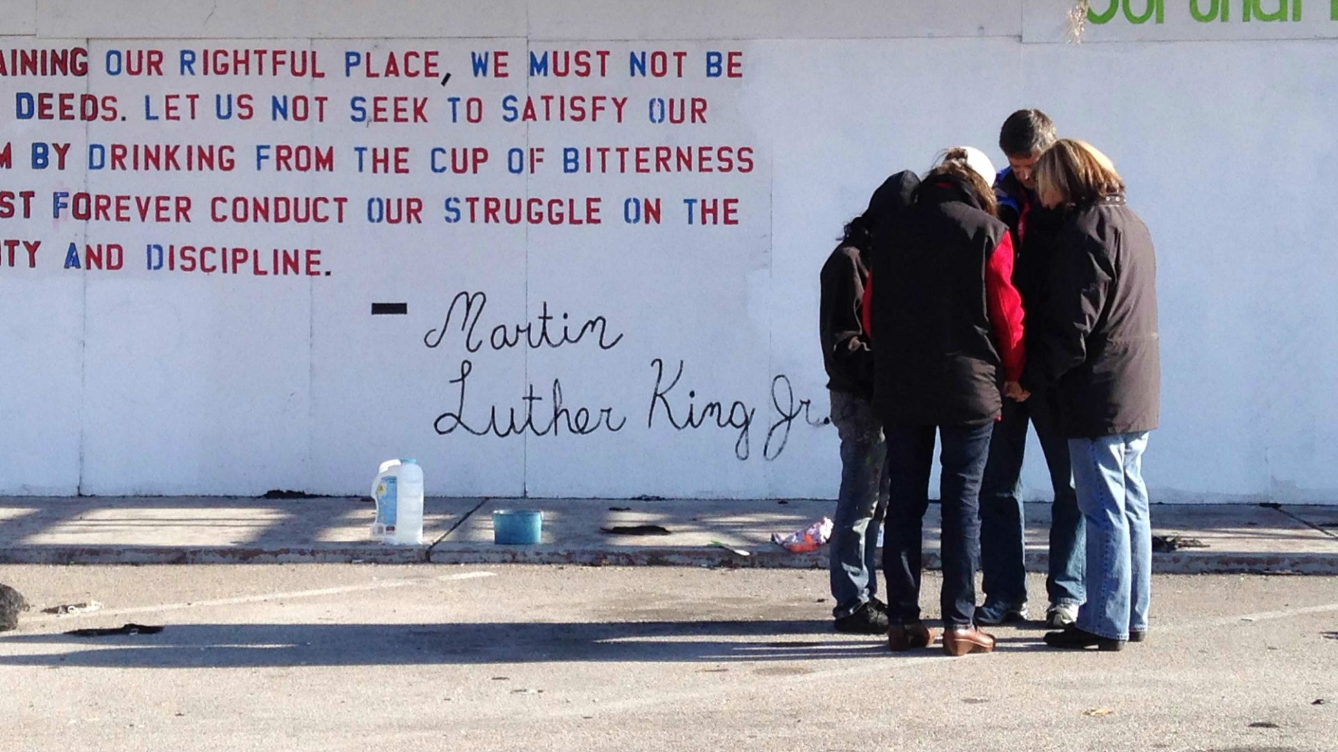 BGEA chaplains pray in Ferguson, Missouri.