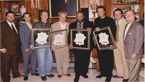 Billy Ray Hearn (right) presents Sparrow awards to Charlie Peacock, Steven Curtis Chapman, Andrae Crouch, and Michael W. Smith.